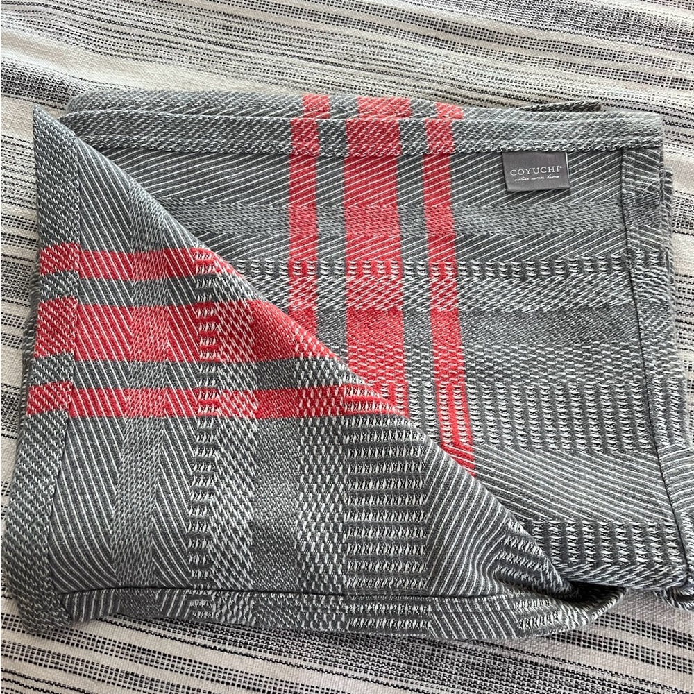 Coyuchi Gray and Orange Blanket with Woven Texture and Plaid Design